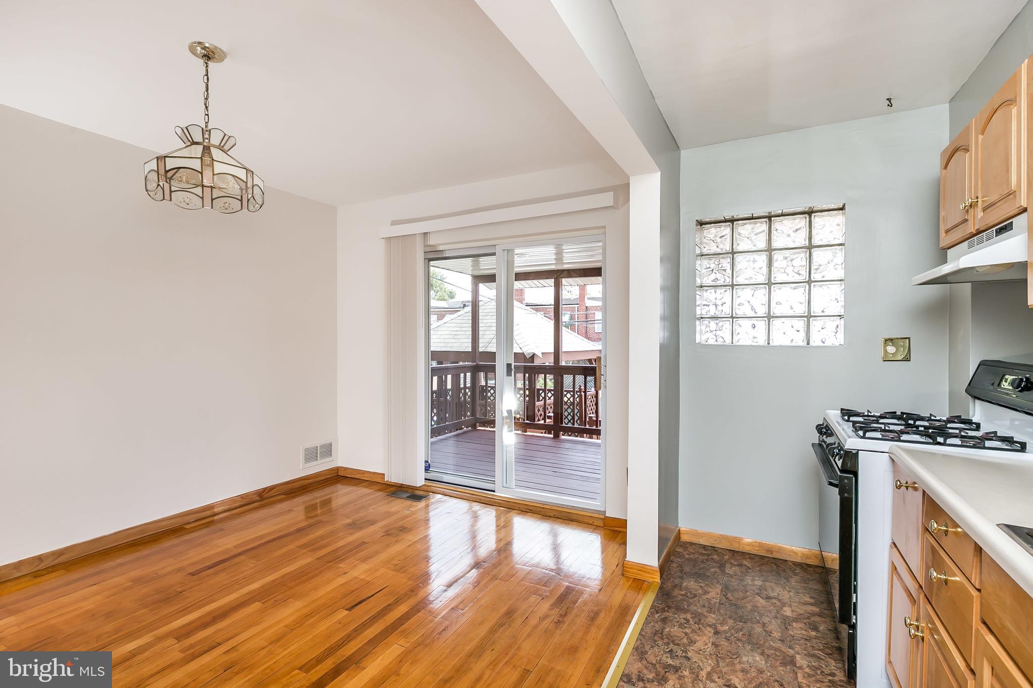 6841 Belclare Road Baltimore, MD 21222 - Photo 7 of 30 Dining Room with slider to deck