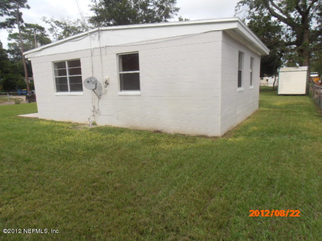 10357 Westmar Road Jacksonville, FL 32218 - Photo 2 of 9 a view of a house with a yard