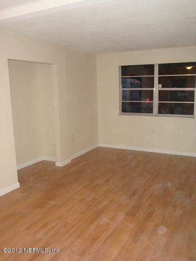 10357 Westmar Road Jacksonville, FL 32218 - Photo 9 of 9 a view of an empty room with a window