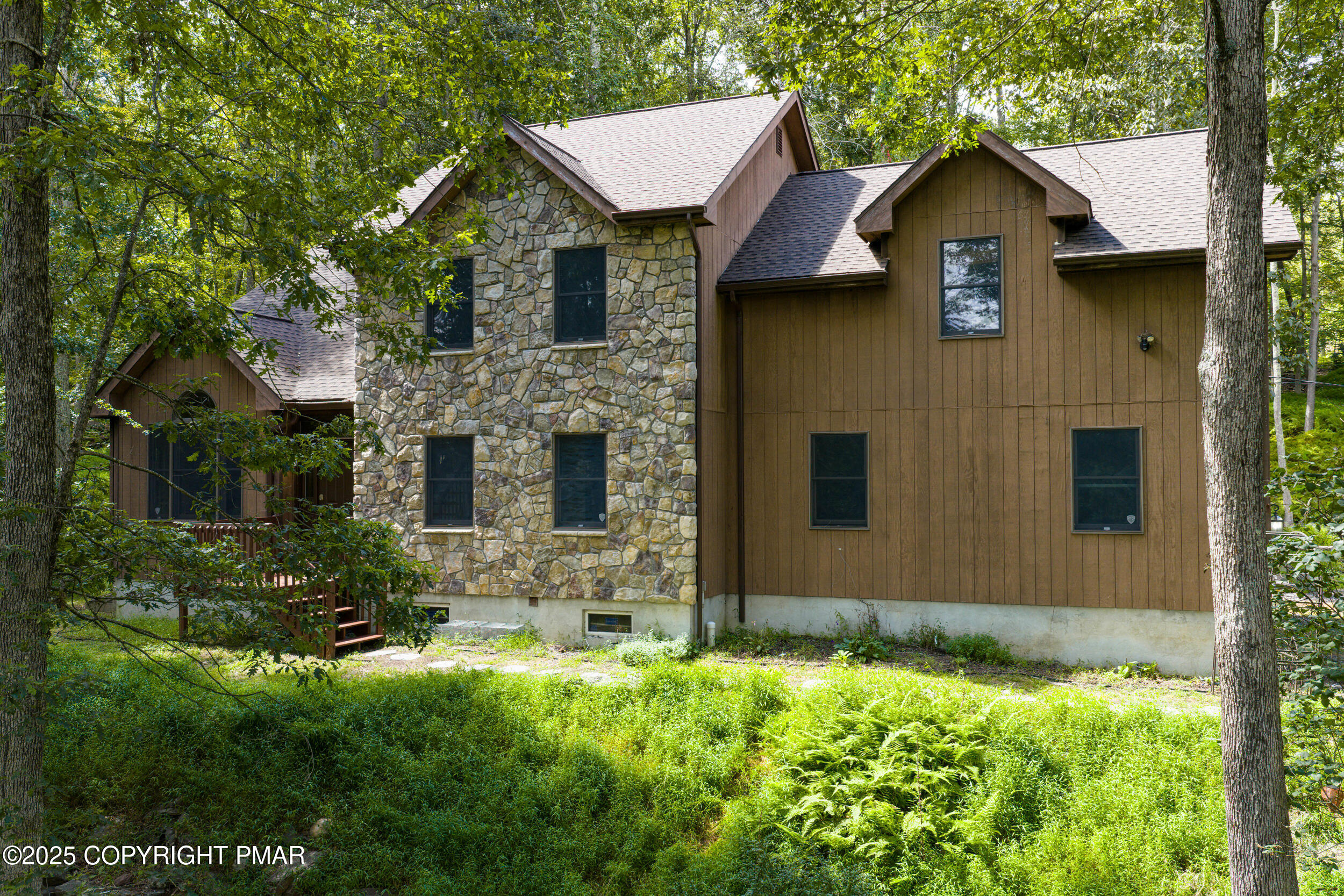5110 Oak Lane Canadensis, PA 18325 - Photo 1 of 58 a front view of a house with a yard
