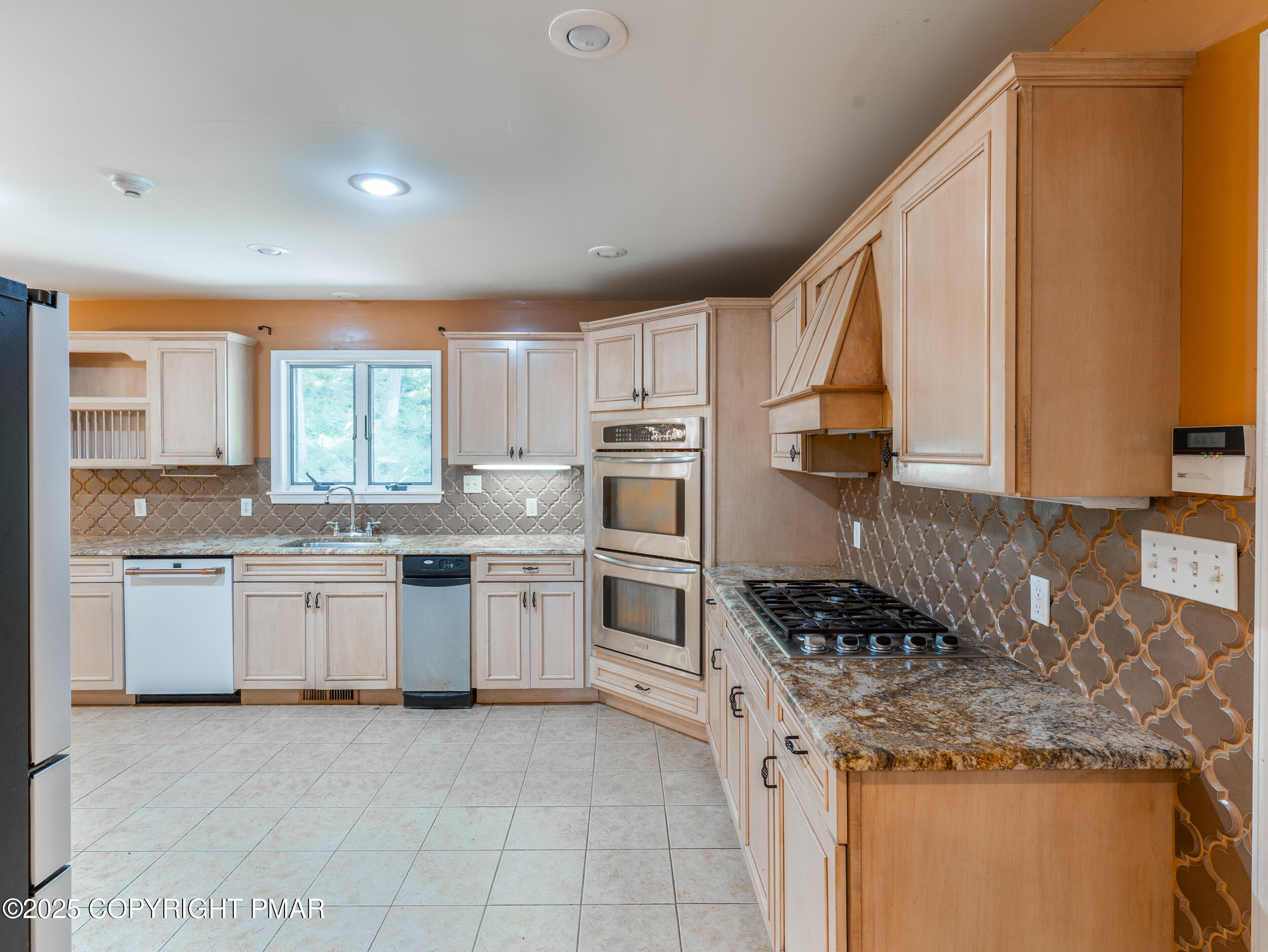 5110 Oak Lane Canadensis, PA 18325 - Photo 15 of 58 a kitchen with a sink stove and refrigerator