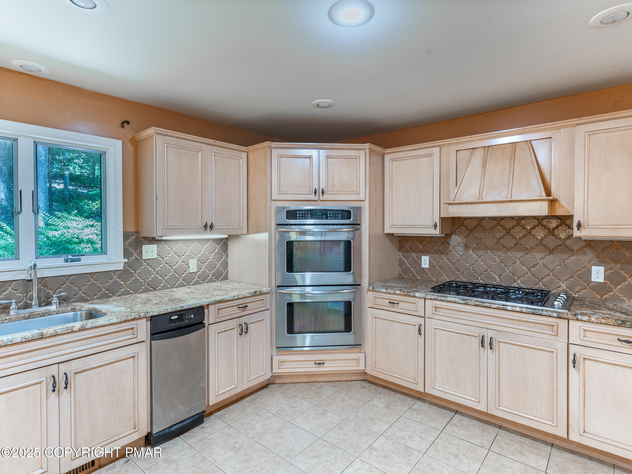 5110 Oak Lane Canadensis, PA 18325 - Photo 18 of 58 a kitchen with granite countertop white cabinets and white stainless steel appliances
