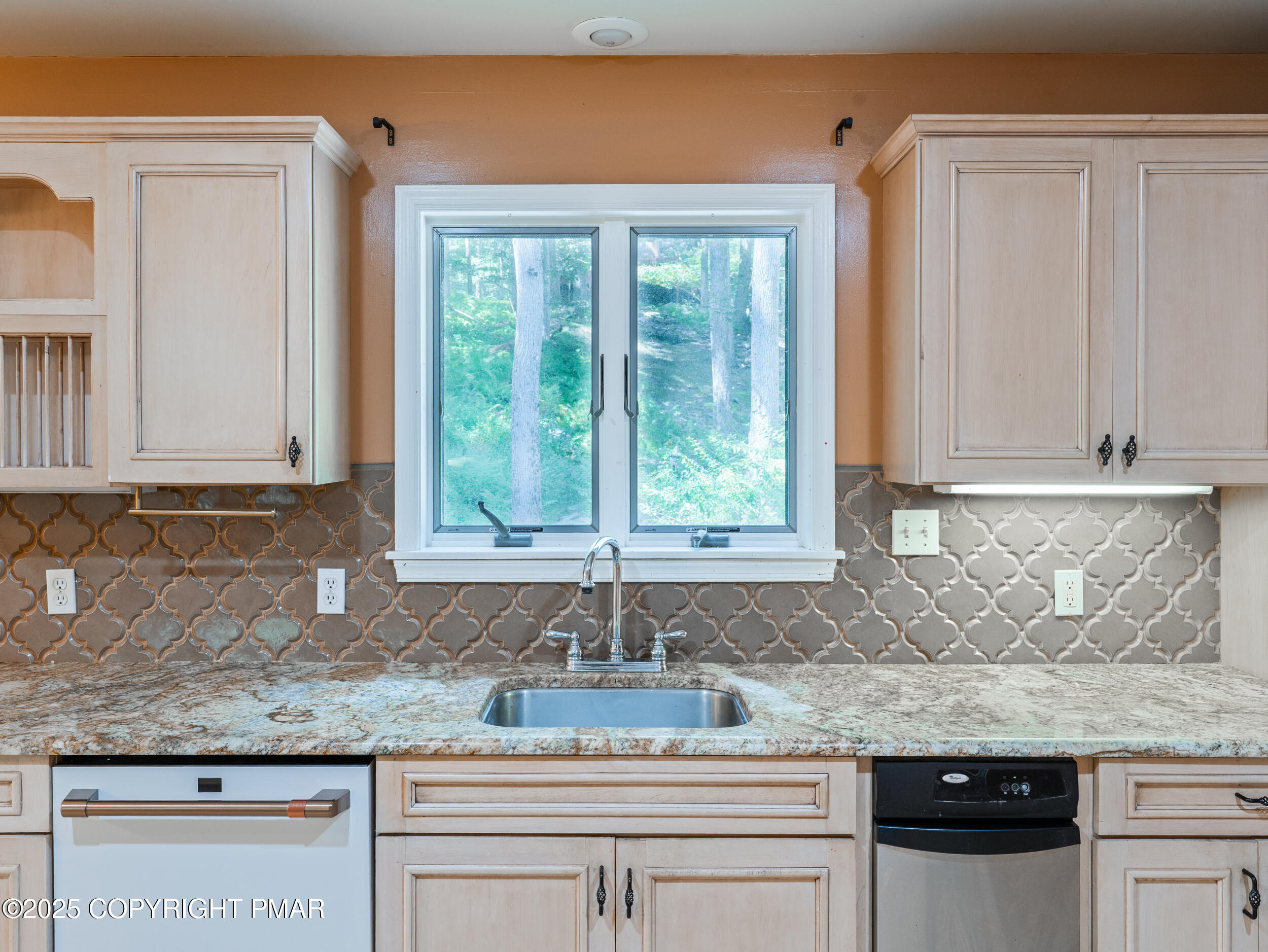 5110 Oak Lane Canadensis, PA 18325 - Photo 19 of 58 a kitchen with granite countertop a sink window and cabinets
