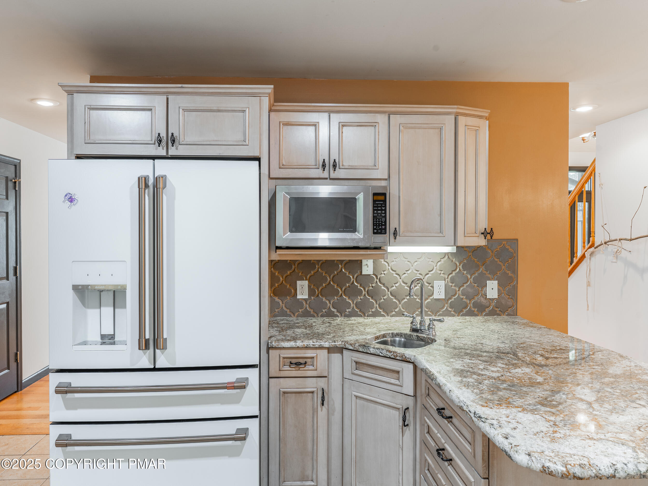 5110 Oak Lane Canadensis, PA 18325 - Photo 20 of 58 a kitchen with stainless steel appliances granite countertop a sink stove and refrigerator