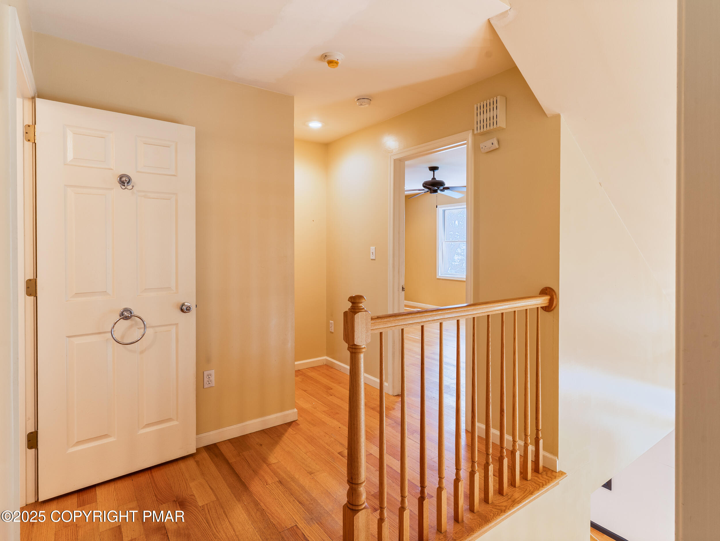 5110 Oak Lane Canadensis, PA 18325 - Photo 25 of 58 a view of a hallway with wooden floor and staircase