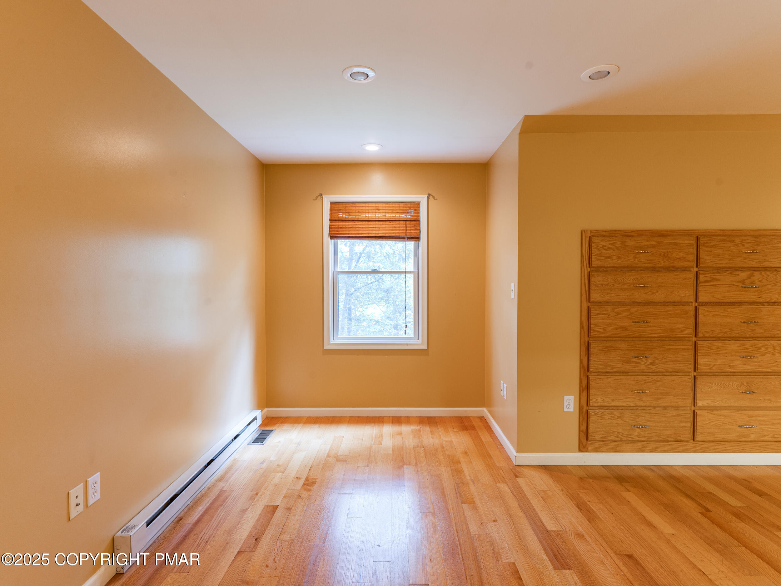 5110 Oak Lane Canadensis, PA 18325 - Photo 31 of 58 a view of an empty room with wooden floor and a window