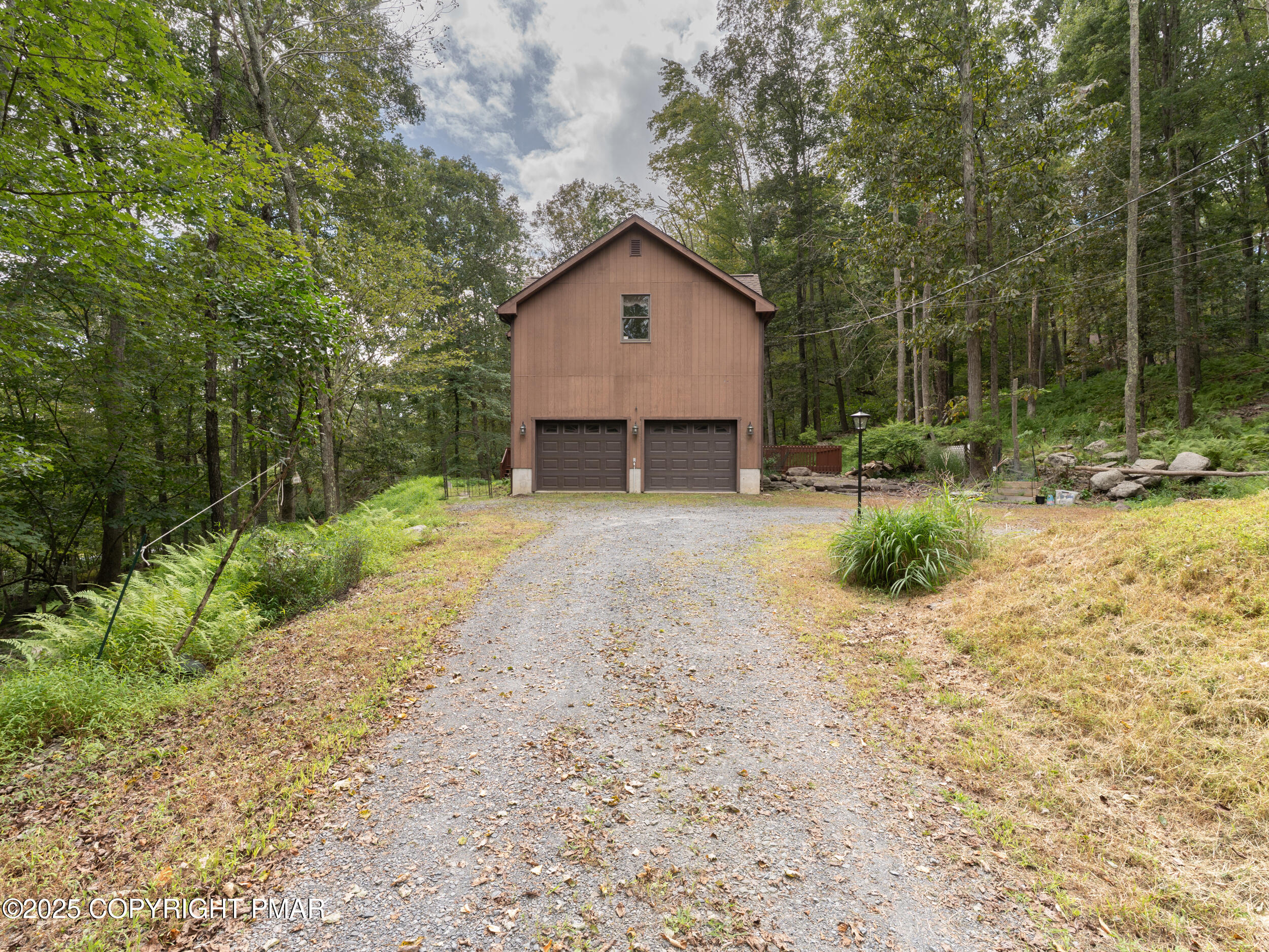 5110 Oak Lane Canadensis, PA 18325 - Photo 43 of 58 a view of a house with backyard and trees
