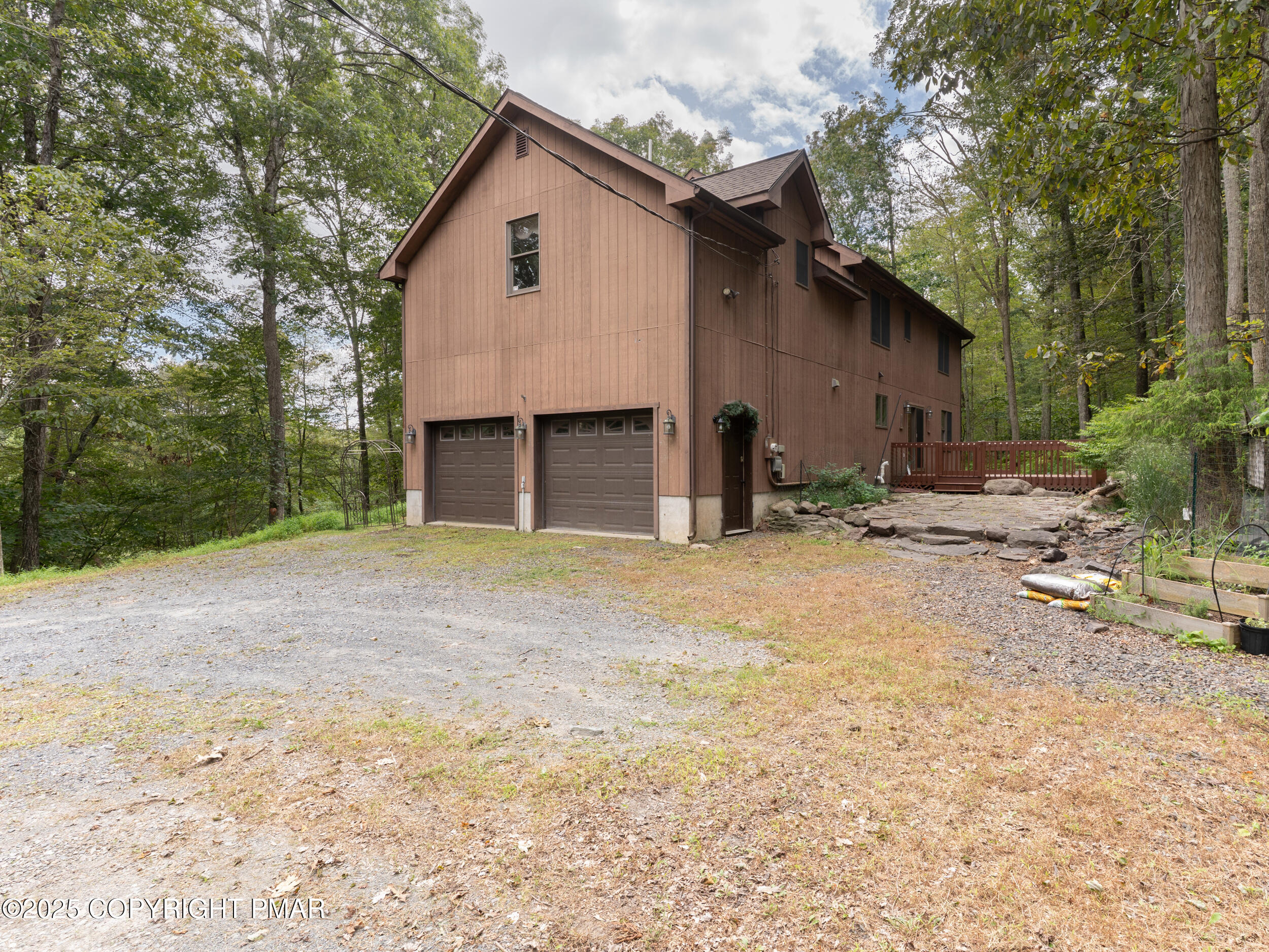 5110 Oak Lane Canadensis, PA 18325 - Photo 44 of 58 a view of a house with backyard and trees