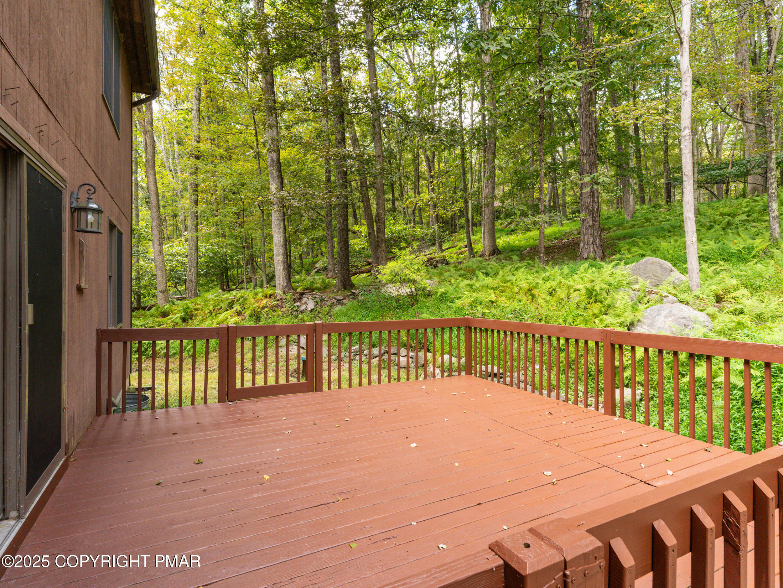 5110 Oak Lane Canadensis, PA 18325 - Photo 45 of 58 a balcony with trees in front of it