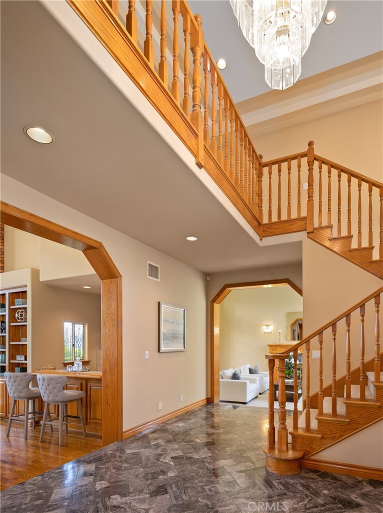 102 Mill Run Monrovia, CA 91016 - Photo 12 of 75 a view of entryway and hall with wooden floor