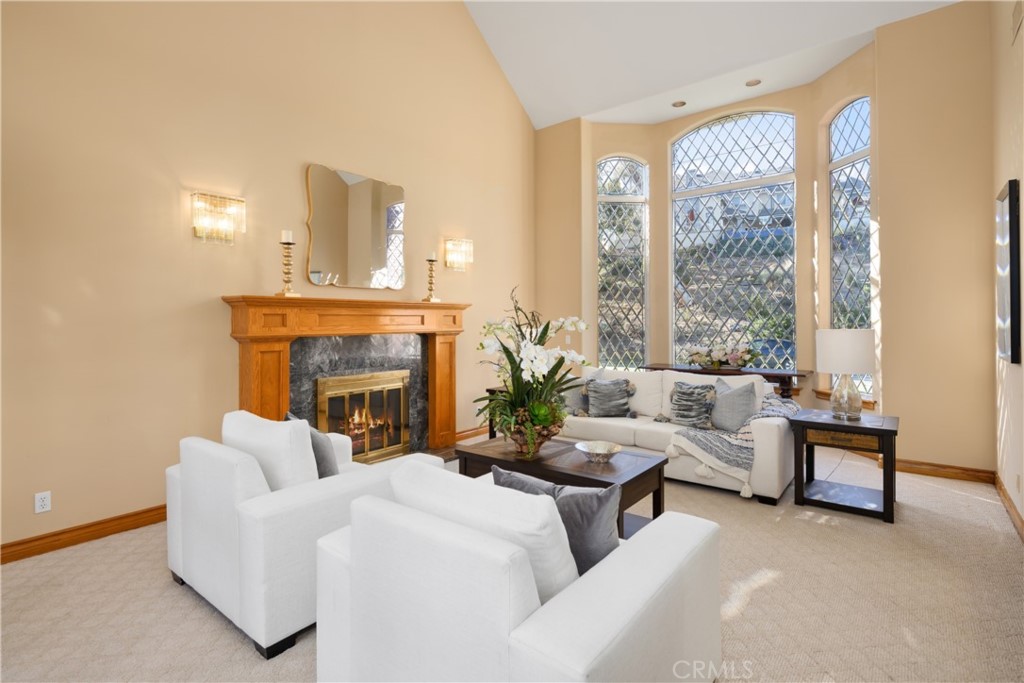 102 Mill Run Monrovia, CA 91016 - Photo 14 of 75 a living room with furniture and a fireplace