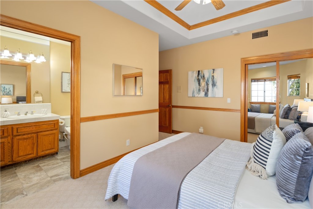 102 Mill Run Monrovia, CA 91016 - Photo 35 of 75 a bedroom with a bed and a dresser