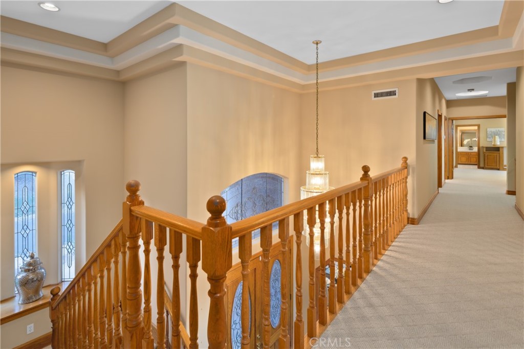 102 Mill Run Monrovia, CA 91016 - Photo 37 of 75 a view of a hallway with stairs