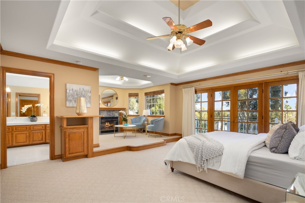 102 Mill Run Monrovia, CA 91016 - Photo 39 of 75 a spacious bedroom with a large bed and a large window with the view of balcony