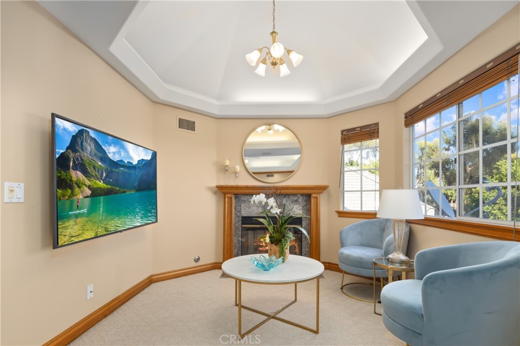 102 Mill Run Monrovia, CA 91016 - Photo 40 of 75 a living room with furniture a fireplace and a large window