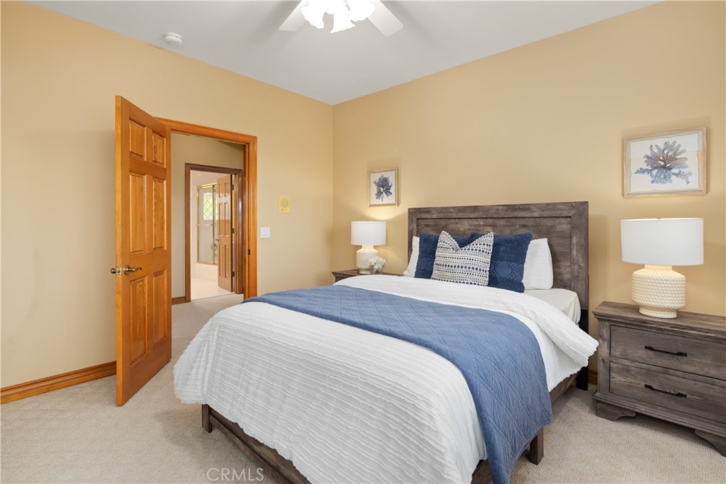 102 Mill Run Monrovia, CA 91016 - Photo 47 of 75 a bedroom with a bed and a lamp