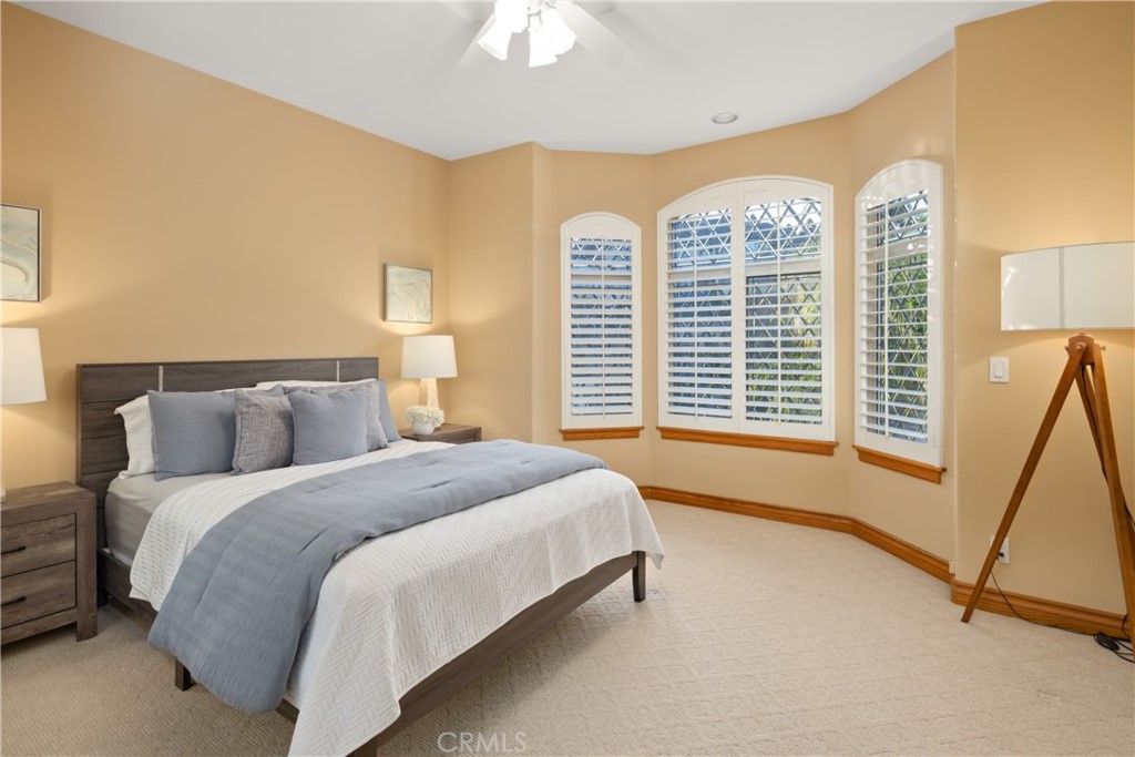 102 Mill Run Monrovia, CA 91016 - Photo 49 of 75 a spacious bedroom with a bed and a large window
