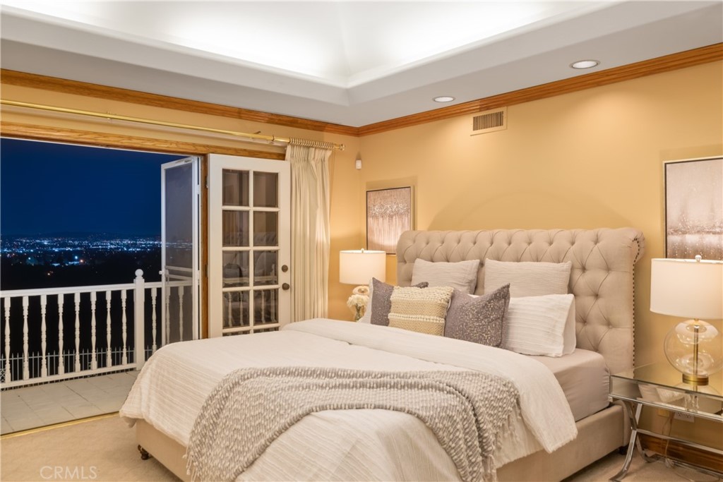 102 Mill Run Monrovia, CA 91016 - Photo 66 of 75 a bedroom with a large bed and a window