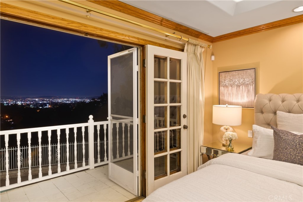 102 Mill Run Monrovia, CA 91016 - Photo 67 of 75 a bedroom with a bed and balcony view