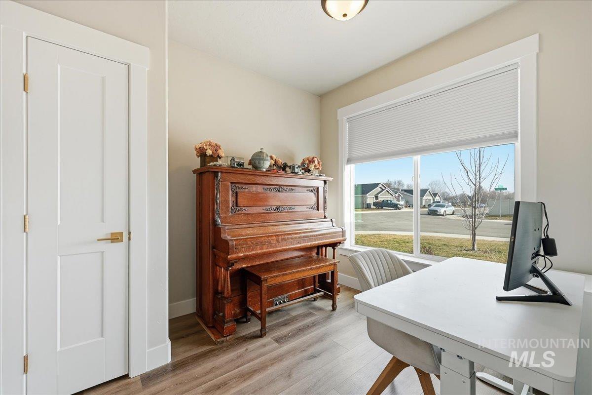 305 Tiffany Rose Way Wilder, ID 83676 - Photo 7 of 31 Office space featuring light wood-style flooring and baseboards
