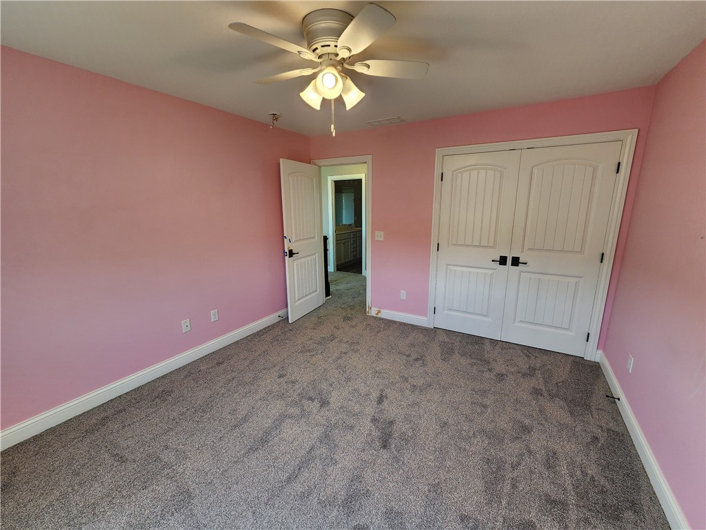 7441 Dodson Road Brookville, OH 45309 - Photo 32 of 50 This spacious bedroom offers ample comfort and versatility.