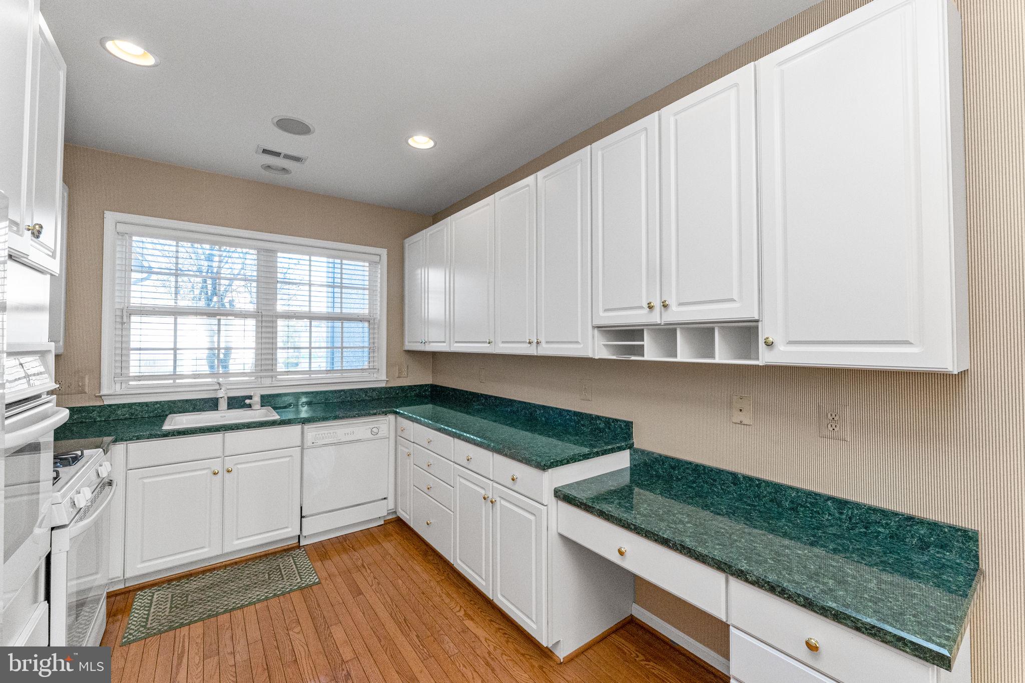 376 Hobson Place Blue Bell, PA 19422 - Photo 14 of 29 a kitchen with granite countertop white cabinets and a sink