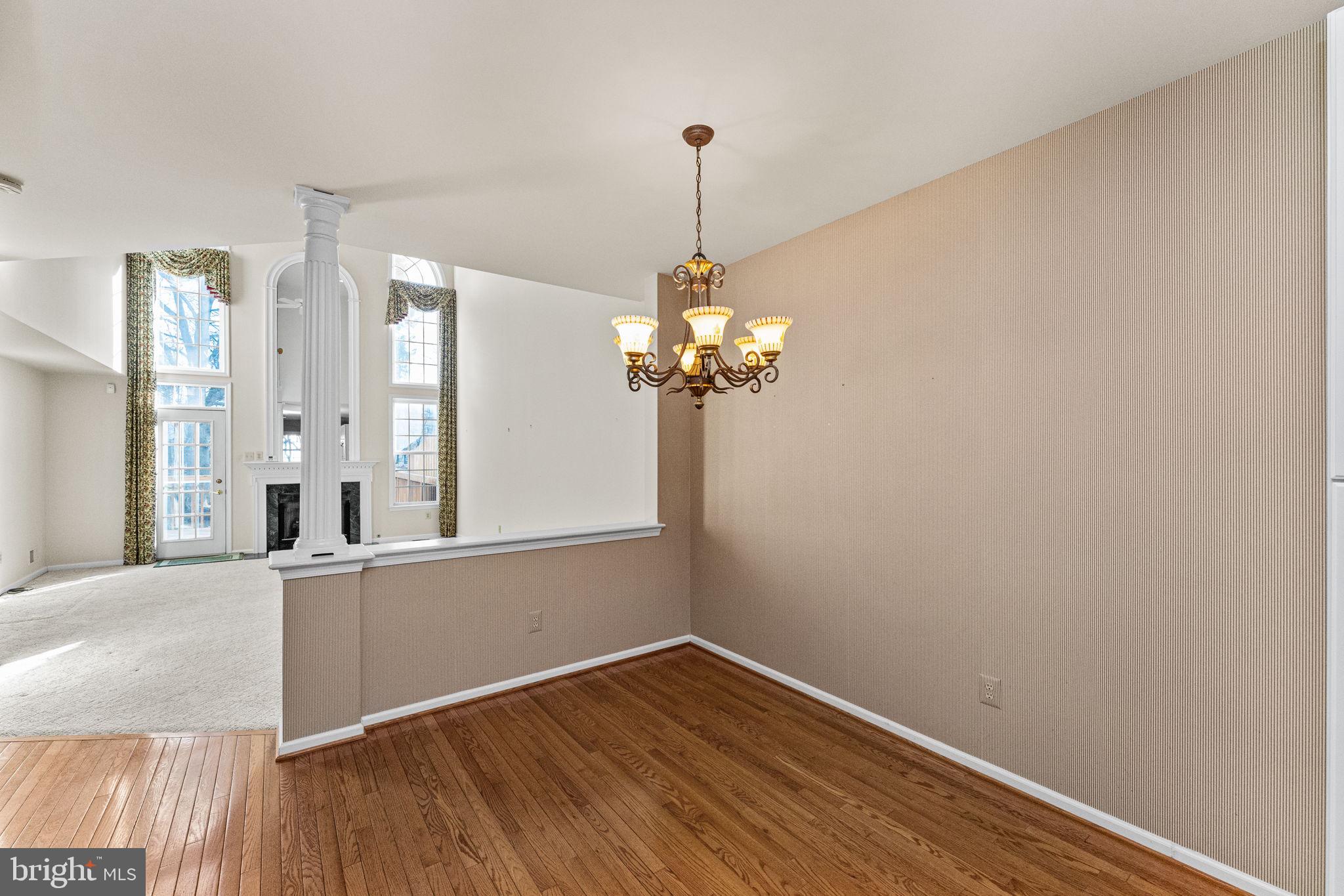 376 Hobson Place Blue Bell, PA 19422 - Photo 15 of 29 a view of a room with wooden floor and a chandelier