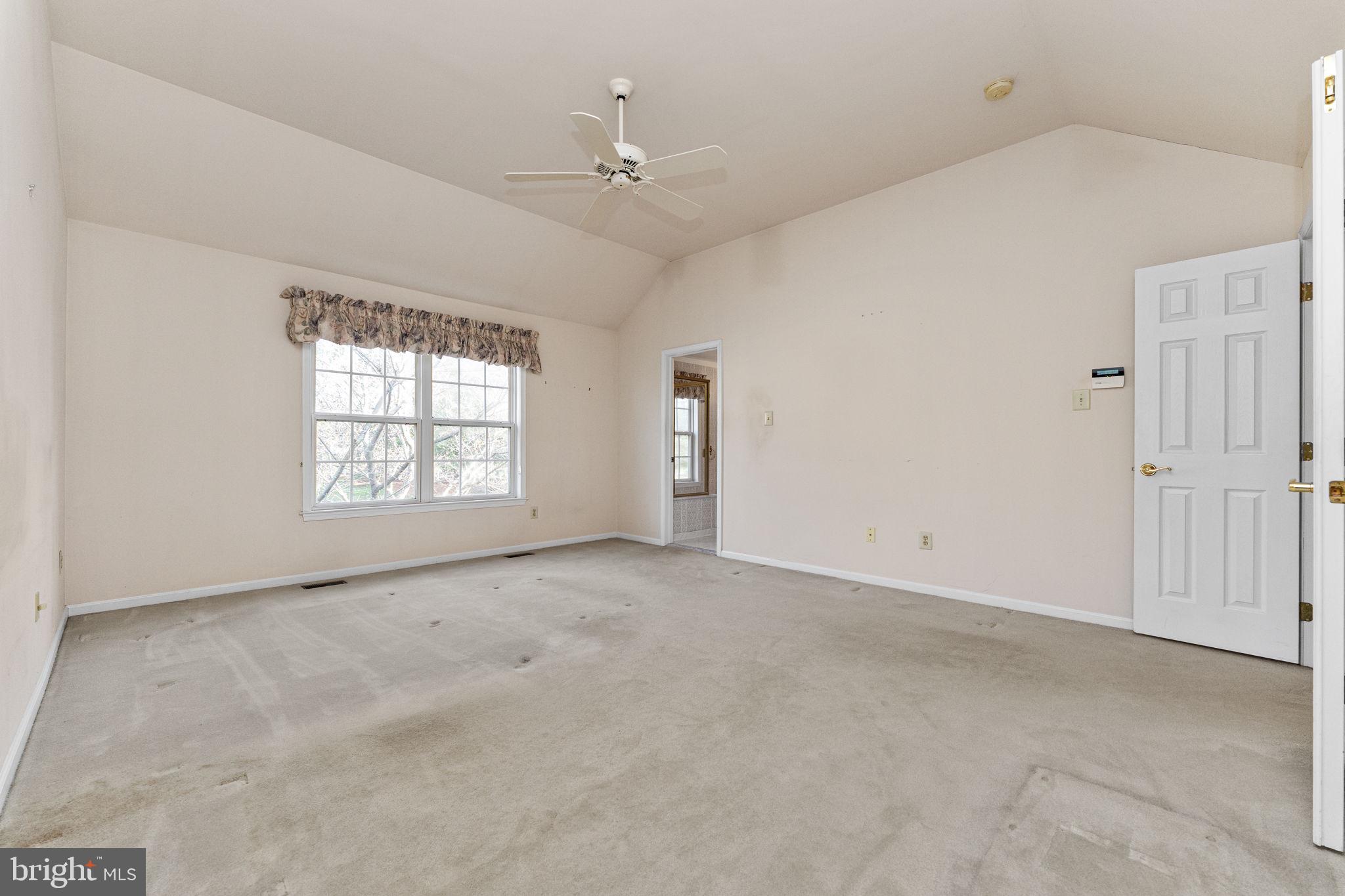 376 Hobson Place Blue Bell, PA 19422 - Photo 17 of 29 an empty room with windows and ceiling fan
