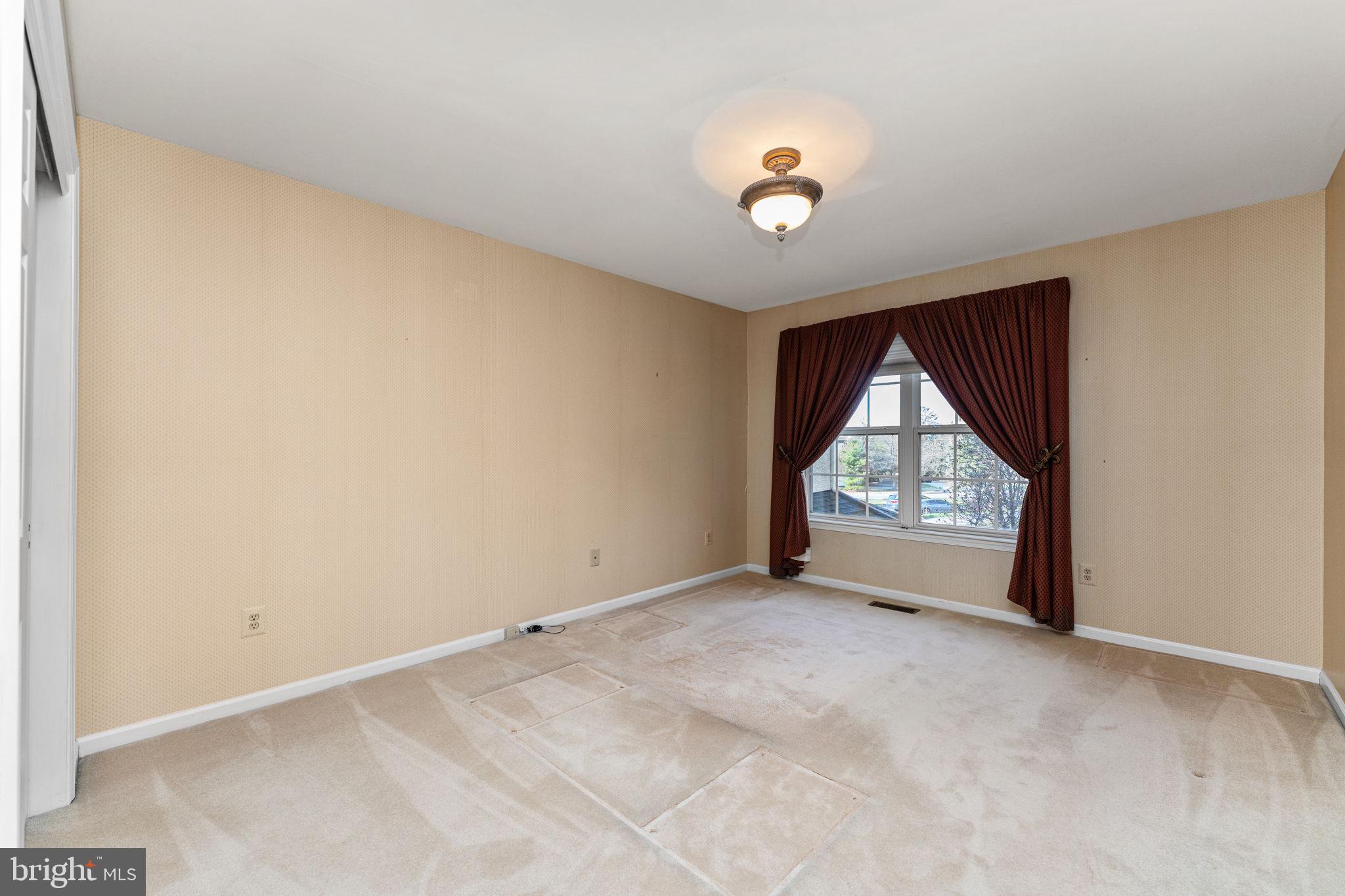 376 Hobson Place Blue Bell, PA 19422 - Photo 24 of 29 an empty room with a empty space and windows