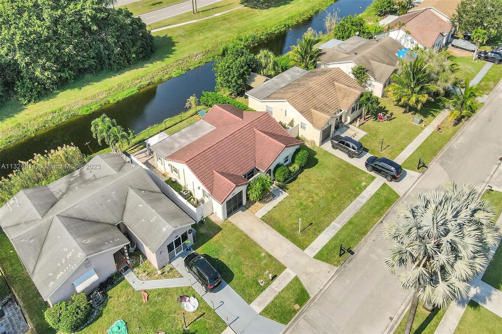 22777 Southwest 56th Avenue Boca Raton, FL 33433 - Photo 30 of 34 an aerial view of a house with a garden