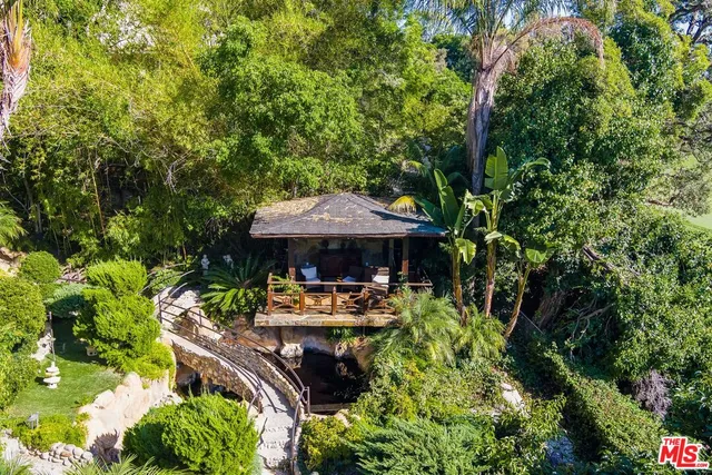 a garden view with a seating space