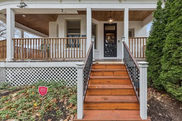 a view of entryway with wooden floor