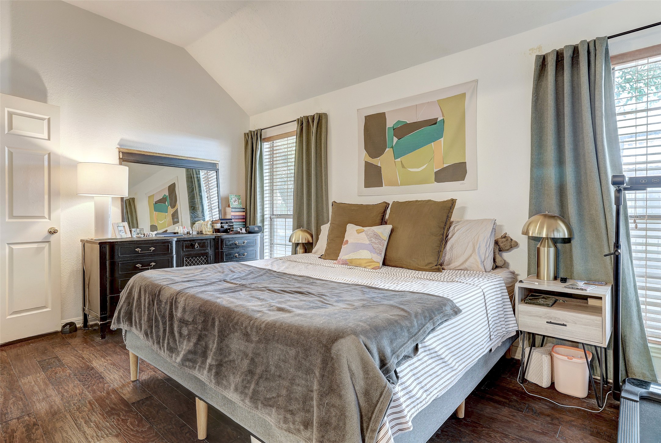 5907 Shanghai Pierce Road Austin, TX 78749 - Photo 20 of 29 Bedroom featuring wood finished floors and lofted ceiling