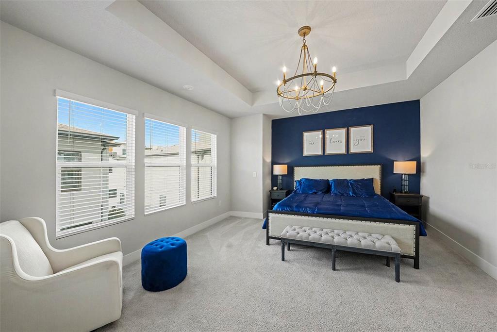 2511 North Grady Avenue, Unit 26 Tampa, FL 33607 - Photo 16 of 30 a bed room with furniture and a window