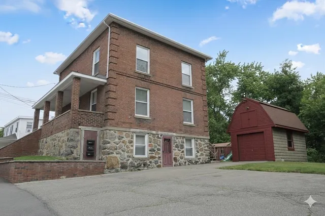a brick building with a large windows
