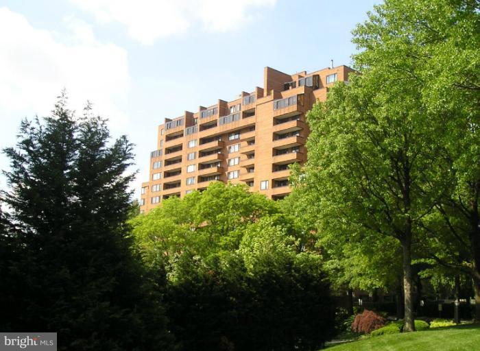 111 Hamlet Hill Road, Unit 902 Baltimore, MD 21210 - Photo 1 of 30 a view of a building with trees