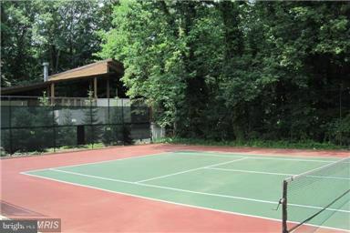 111 Hamlet Hill Road, Unit 902 Baltimore, MD 21210 - Photo 30 of 30 a view of a tennis court