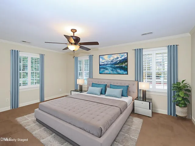 a kitchen with stainless steel appliances a stove refrigerator and wooden floor