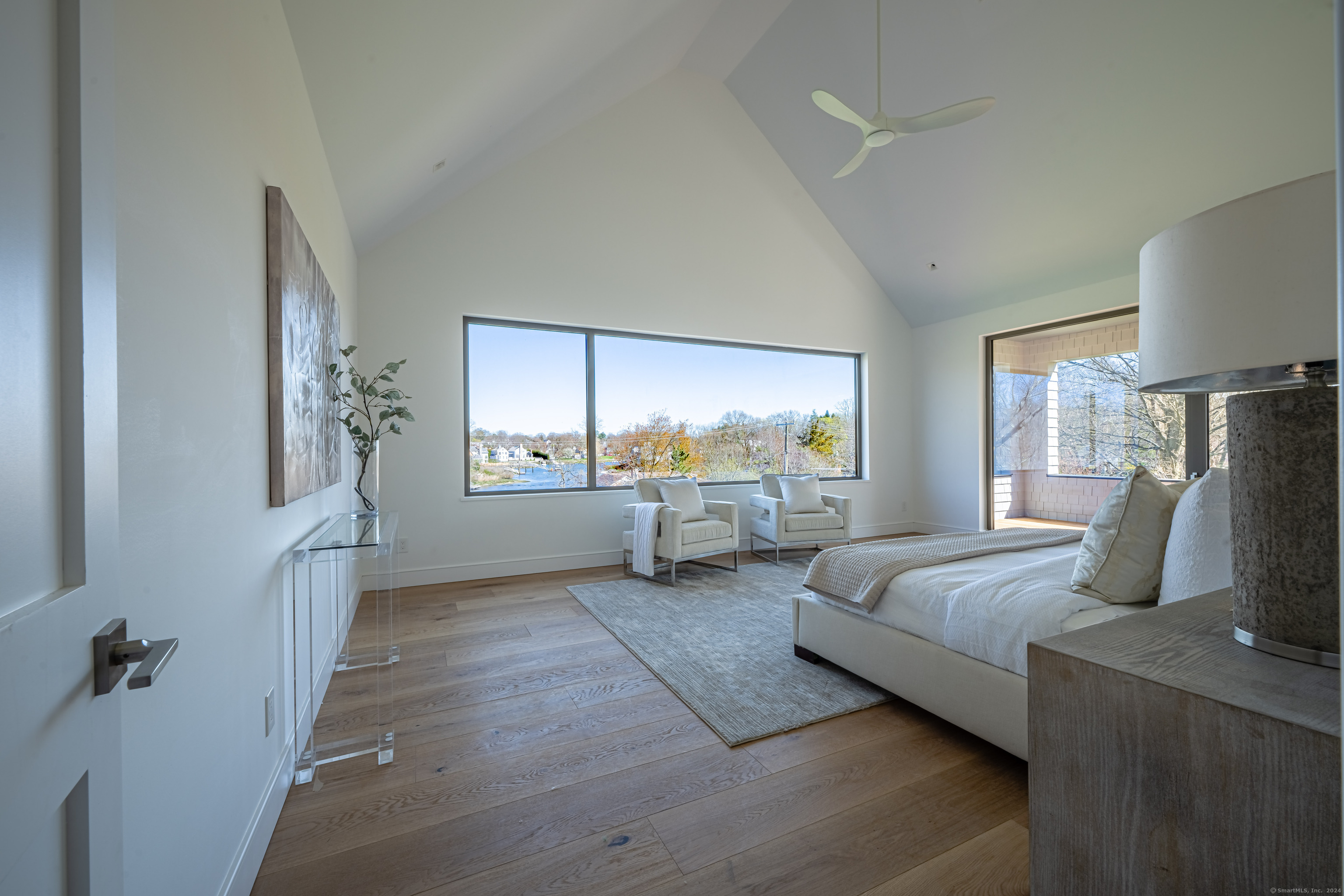 14 5 Mile River Road Darien, CT 06820 - Photo 12 of 21 a bedroom with bed and window