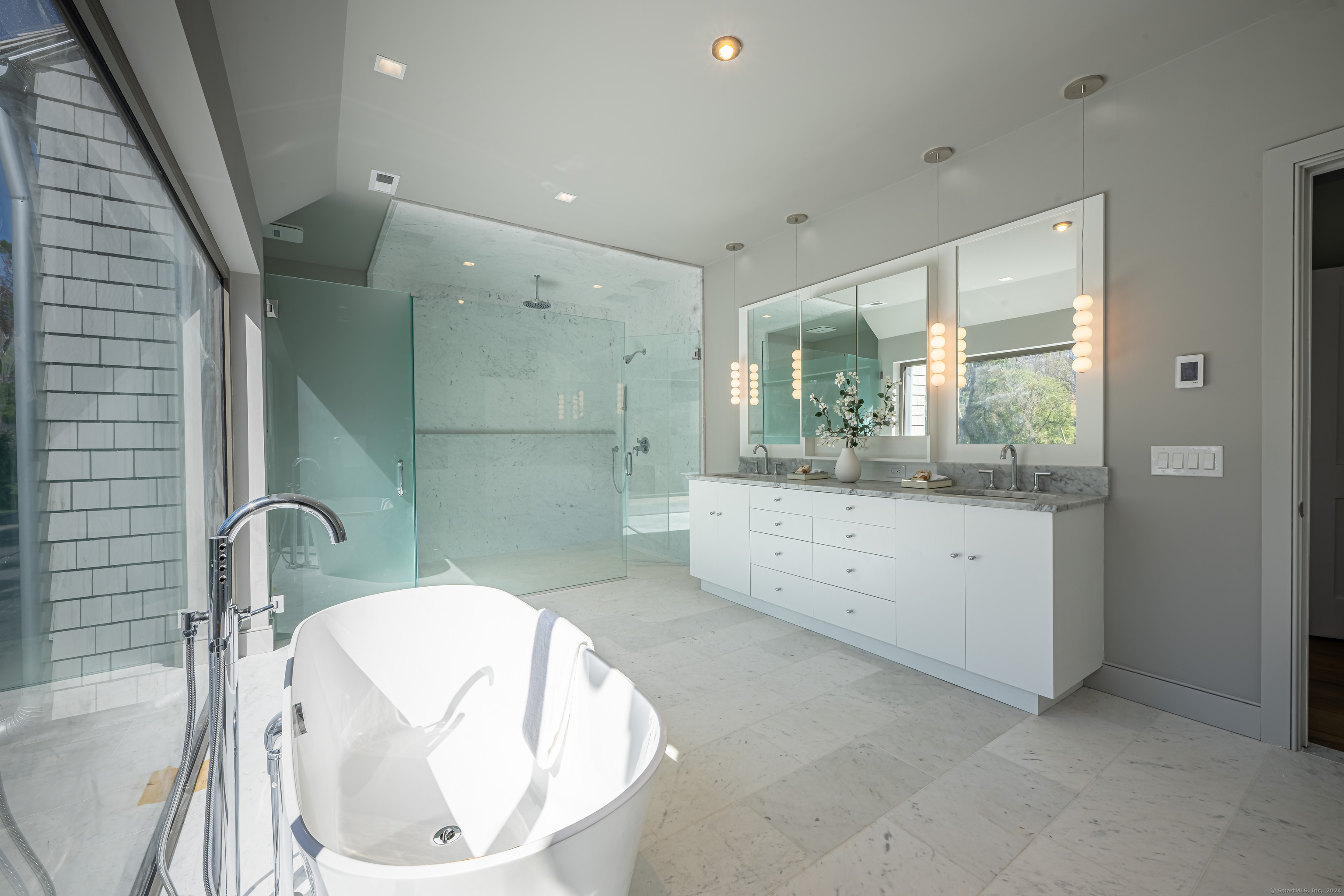 14 5 Mile River Road Darien, CT 06820 - Photo 14 of 21 a bathroom with a sink a toilet and bathtub