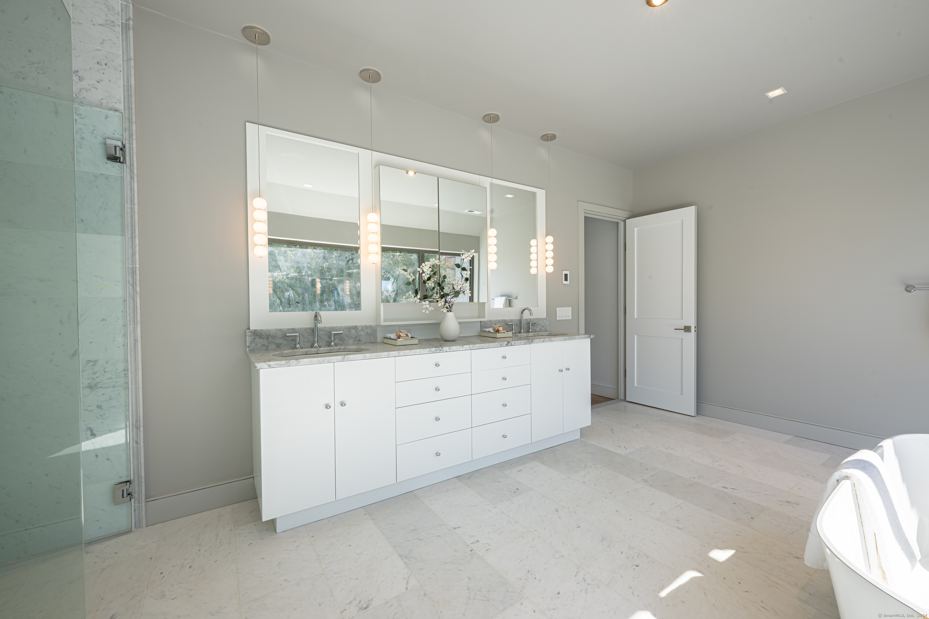 14 5 Mile River Road Darien, CT 06820 - Photo 15 of 21 a room with white cabinets and a window