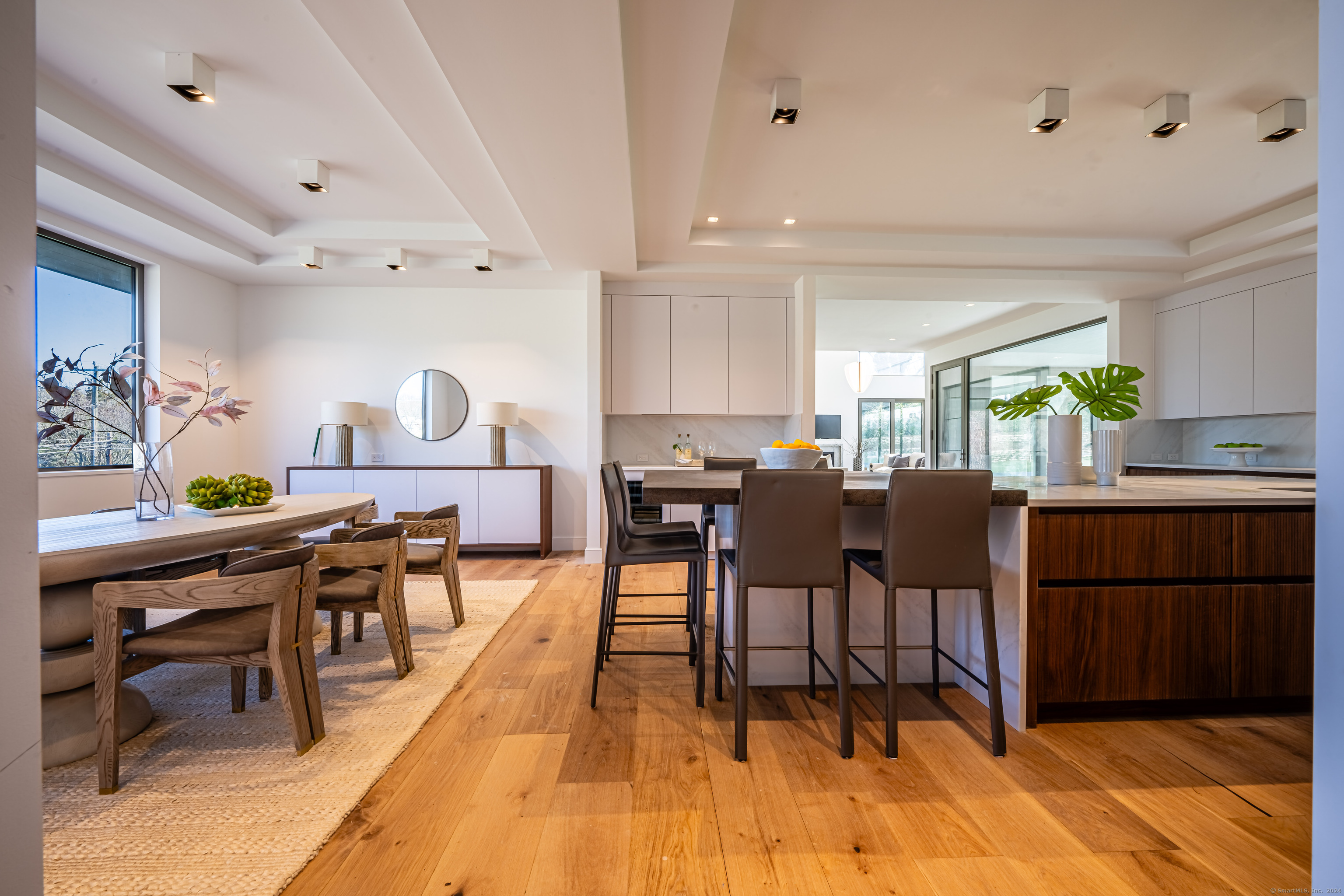 14 5 Mile River Road Darien, CT 06820 - Photo 8 of 21 a view of a dining room with furniture