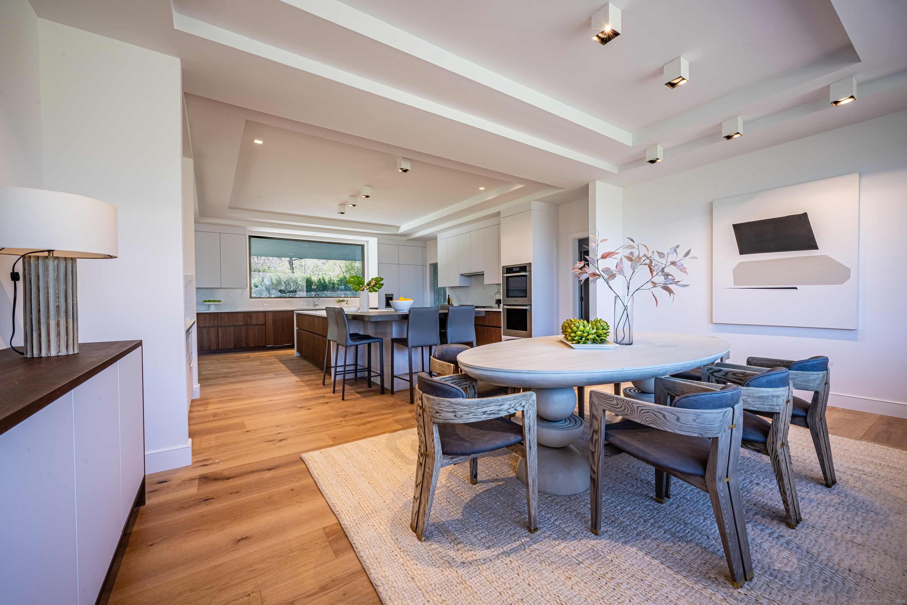 14 5 Mile River Road Darien, CT 06820 - Photo 9 of 21 a view of a dining room with furniture