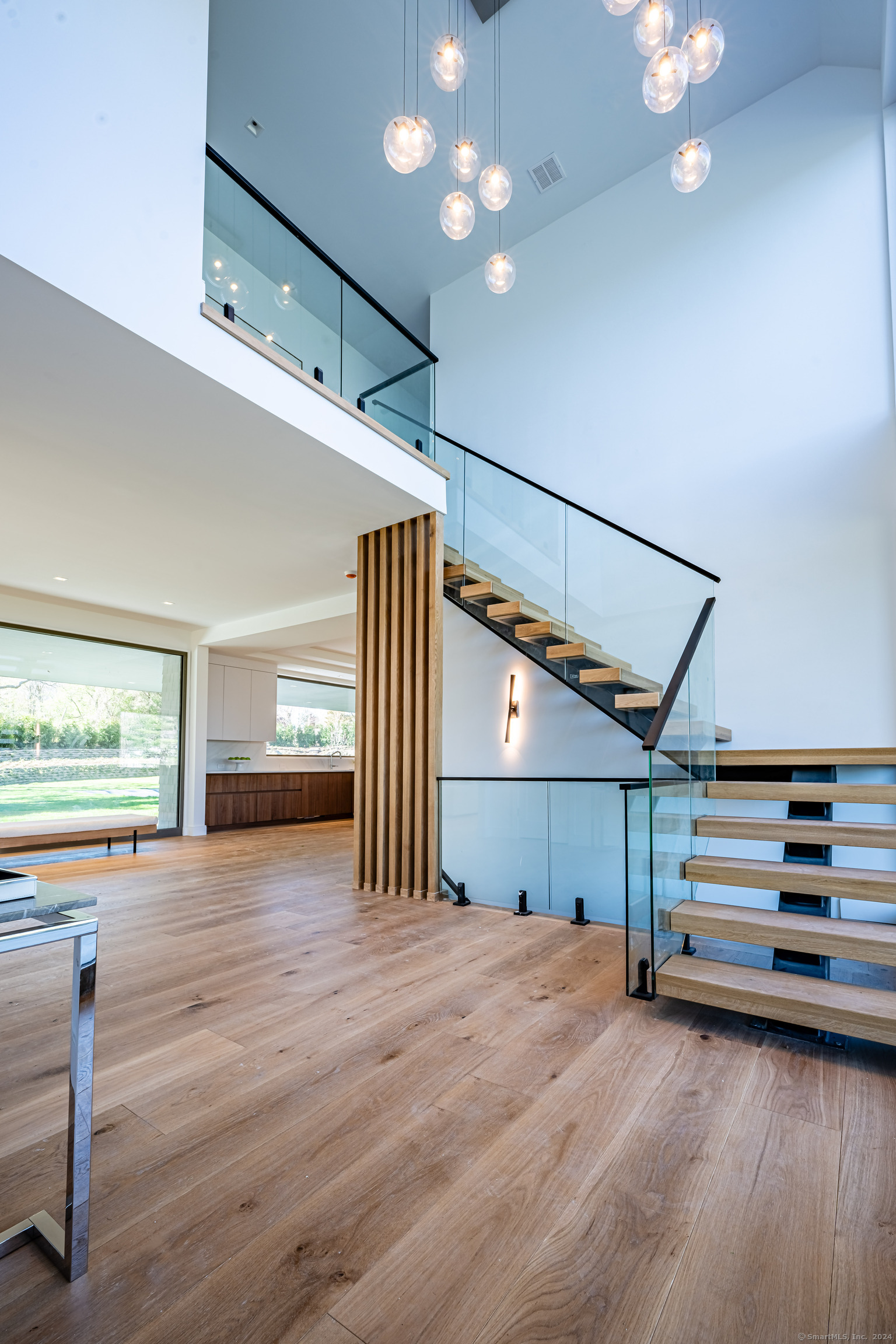 14 5 Mile River Road Darien, CT 06820 - Photo 10 of 21 a view of a room with wooden floor and window