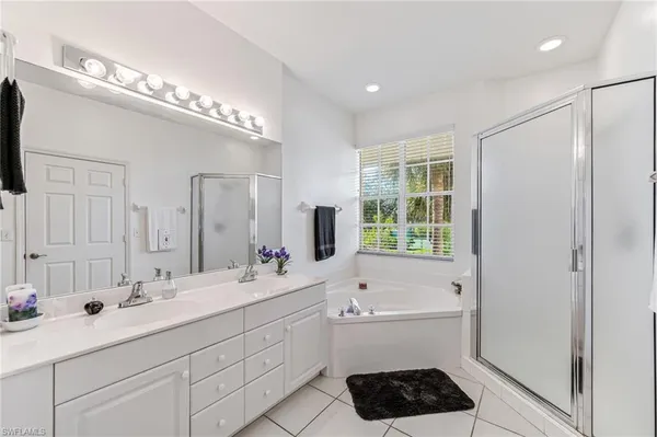 $325,000 | 25778 Lake Amelia Way, Unit 201, Bonita Springs, FL 34135