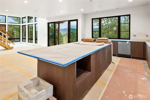 a kitchen with a sink and cabinets