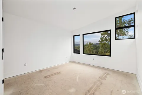 a living room with a couch and a large window