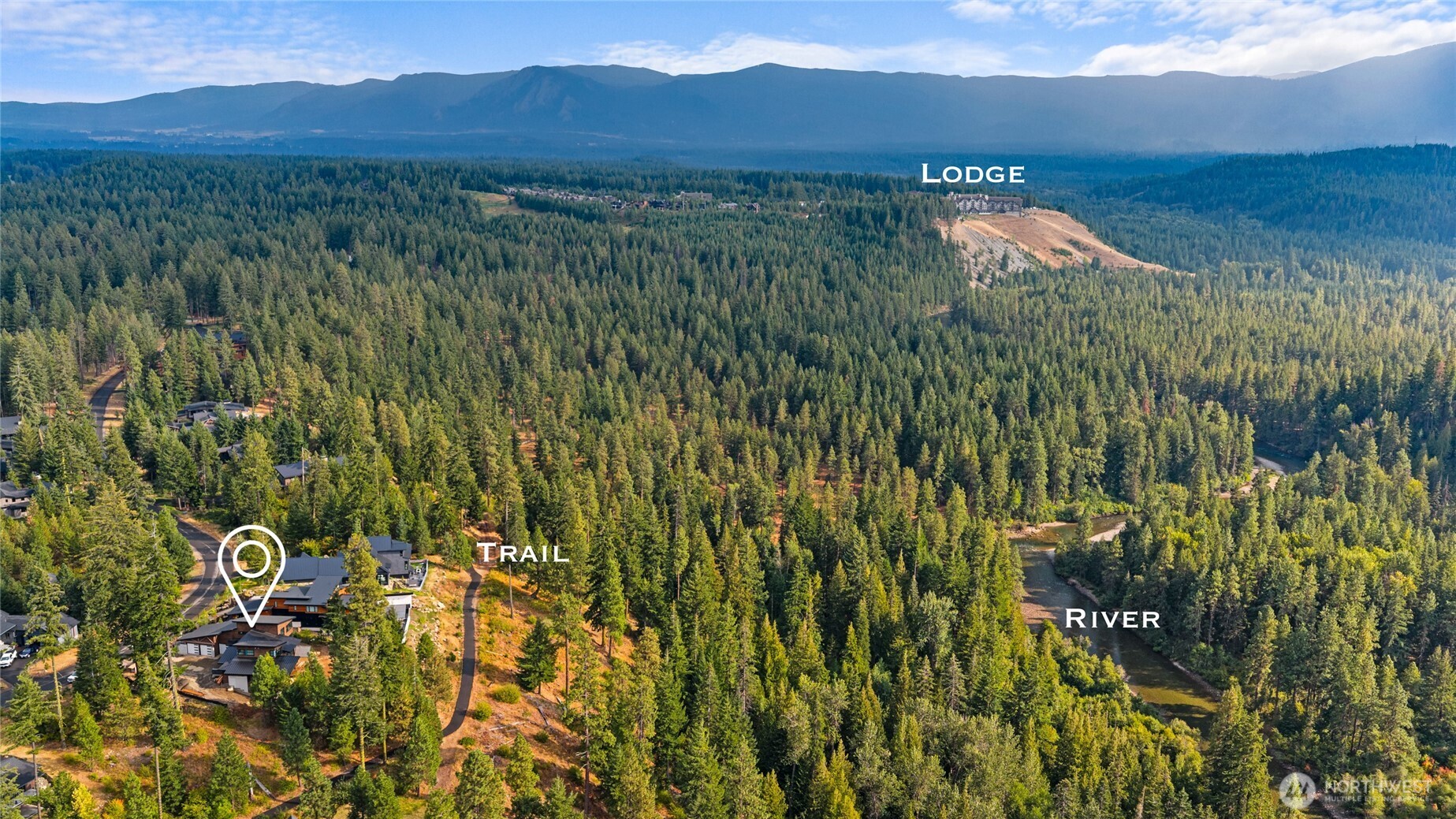 331 Kokanee Loop Cle Elum, WA 98922 - Photo 33 of 40 a view of a lake with a mountain in the background