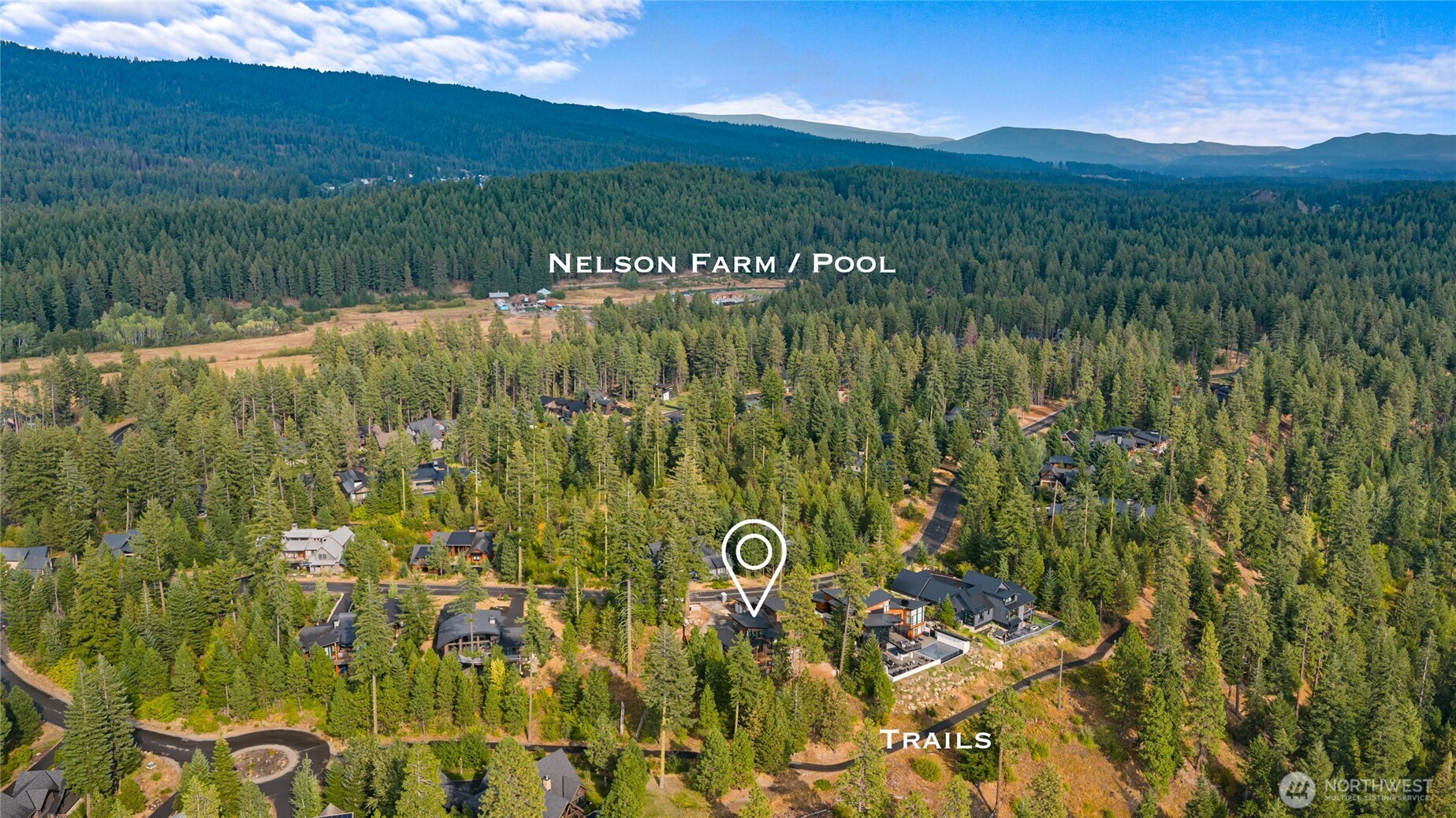 331 Kokanee Loop Cle Elum, WA 98922 - Photo 35 of 40 a view of a lush green outdoor space with a lake view