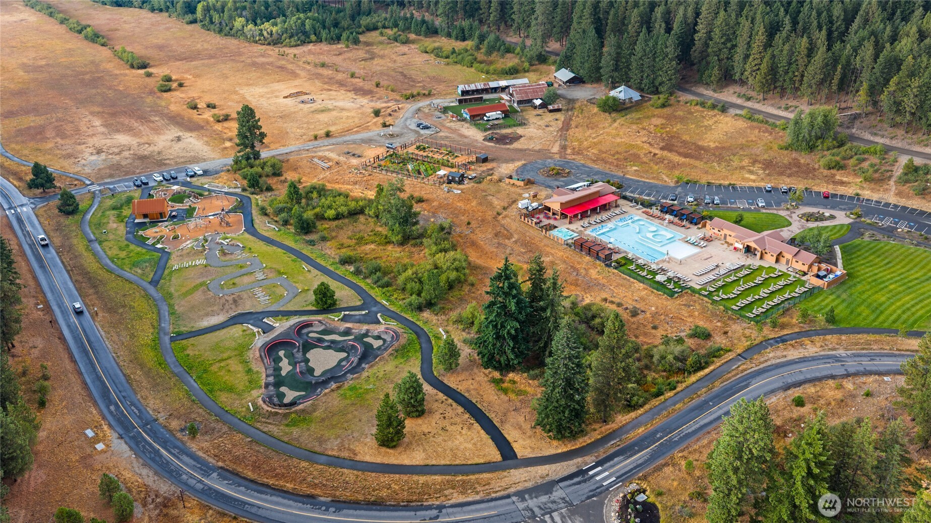 331 Kokanee Loop Cle Elum, WA 98922 - Photo 36 of 40 a view of swimming pool with a porch and furniture
